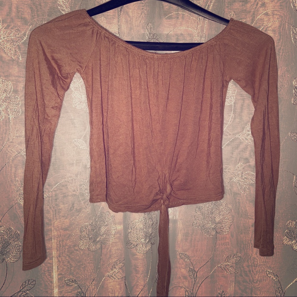 Off the shoulder long sleeve shirt.